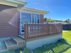 4 Beds including 2 Double Beds, 1 Single Bed, and 1 Double Sofa Bed in a small 1 bedroom and 1 lounge Studio No Kitchen Only fridge, microwave, Rotorua